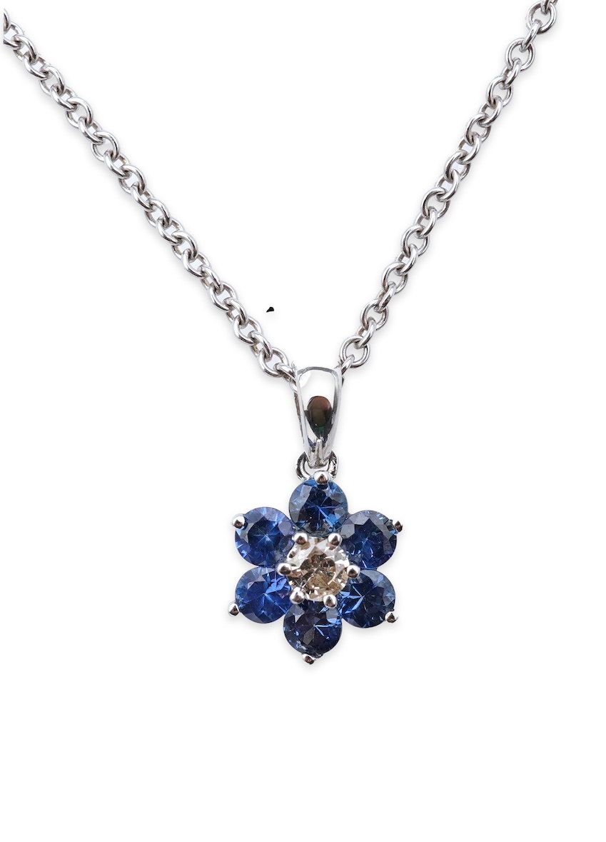 A sapphire and diamond pendant
